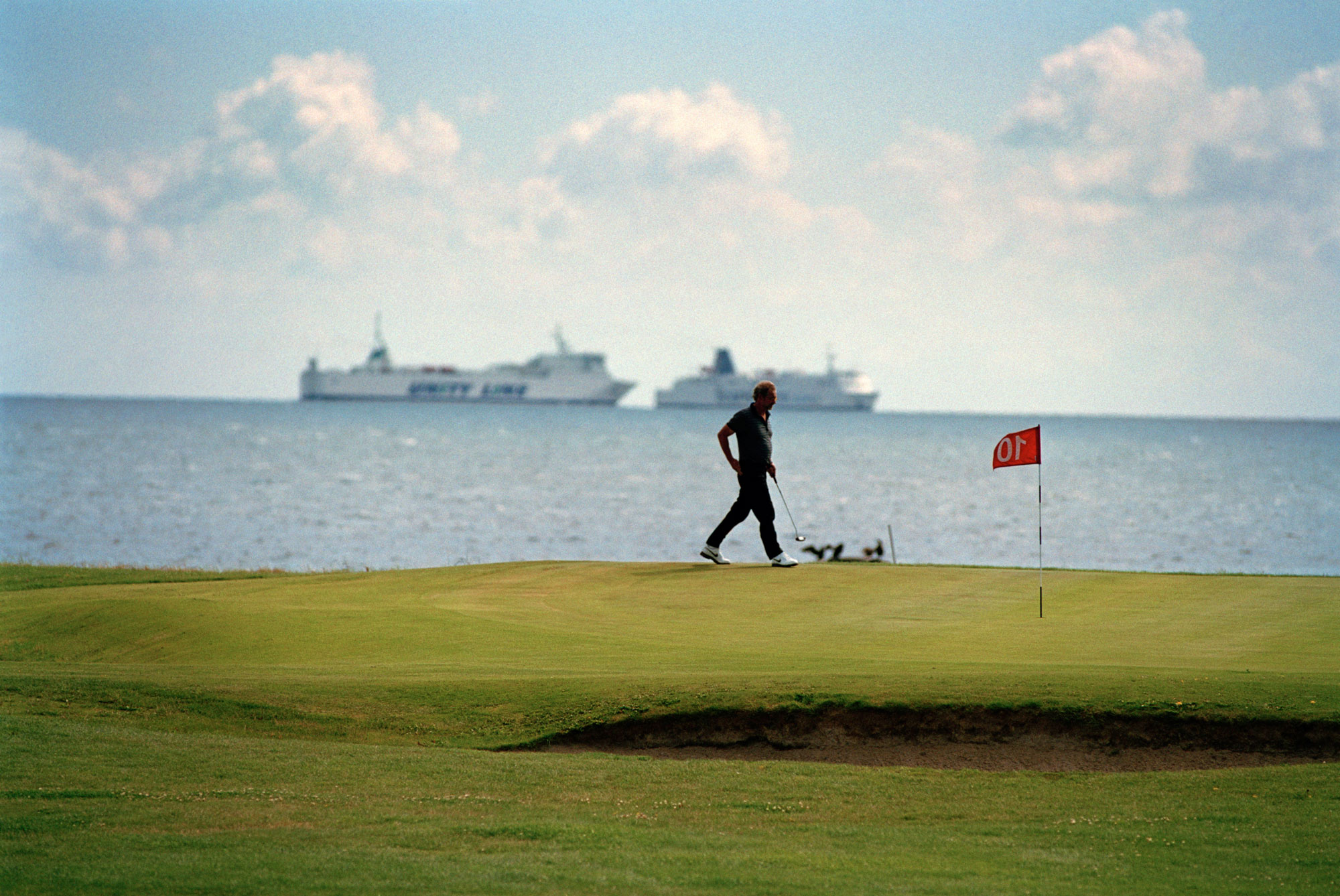 golfpelare på green